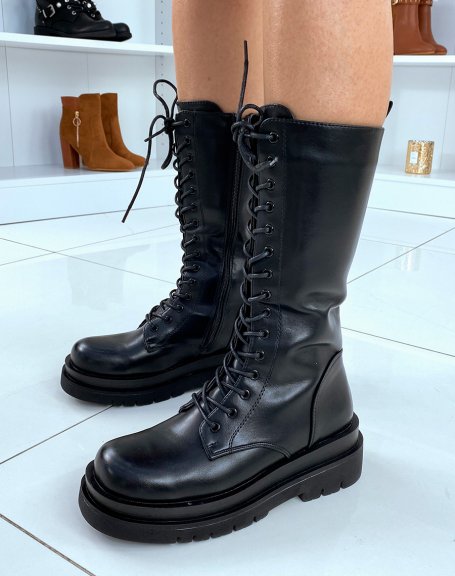 Tall black lace-up boots