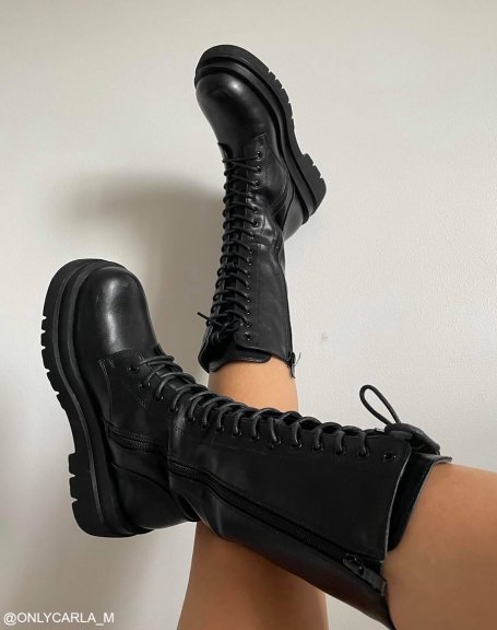 Tall black lace-up boots