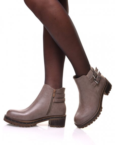 Taupe ankle boots with lugged and studded soles