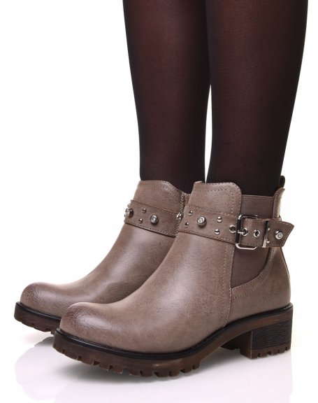 Taupe ankle boots with straps adorned with rhinestones and small studs