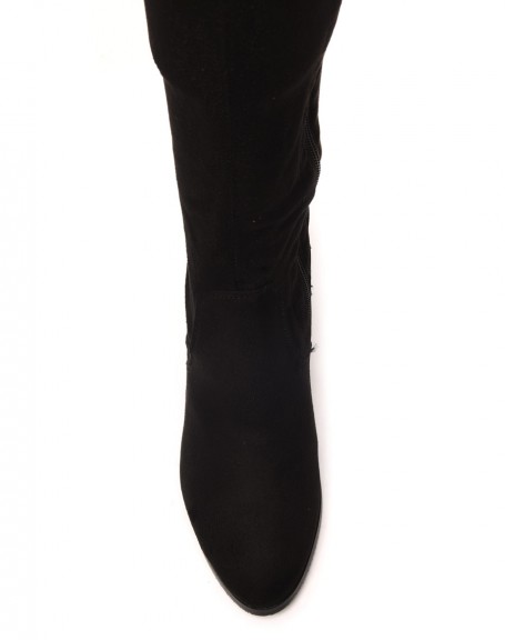 Thigh-high boots with adjustable heels at the top, lined interior