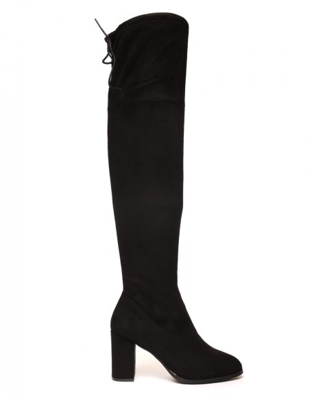 Thigh-high boots with adjustable heels at the top, lined interior