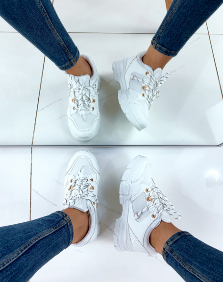 White bi-material sneakers with wedge soles and fancy laces