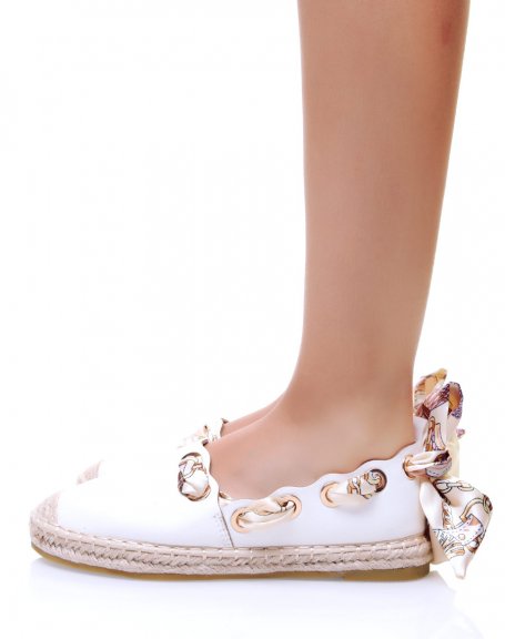 White espadrilles with ribbons
