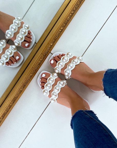 White flat mules with double straps and white pearls