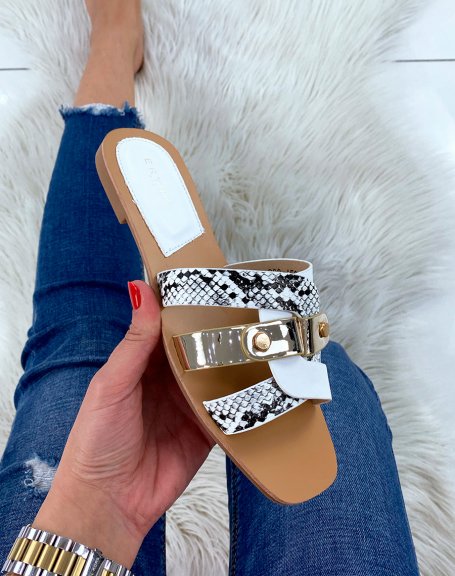 White flat mules with interlocking straps and python and gold details