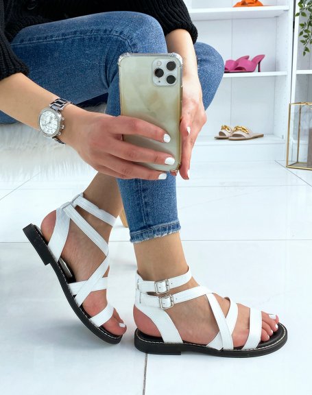 White flat sandals with multiple straps