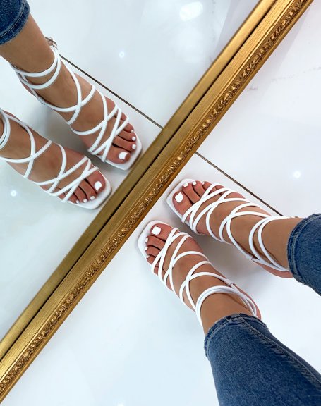 White heeled sandals with multiple straps