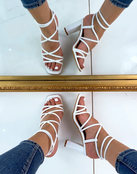 White heeled sandals with multiple straps