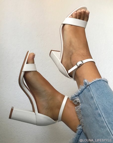 White heeled sandals with thin straps
