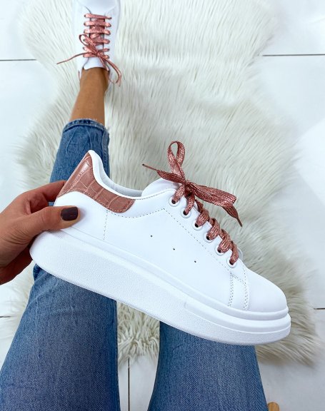 White high top sneakers with pink glitter laces