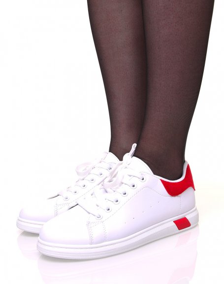 White lace-up sneakers with red details