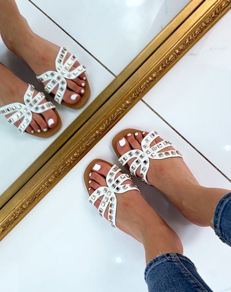White mules with multiple straps and studs