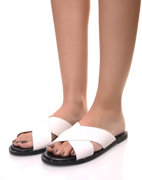 White mules with thick crossover strap