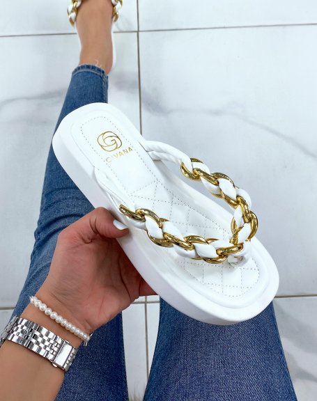 White mules with thick sole and black and gold twisted strap