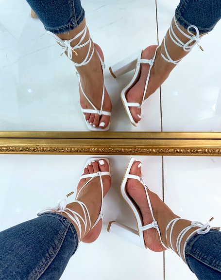 White multi-strap heeled sandals