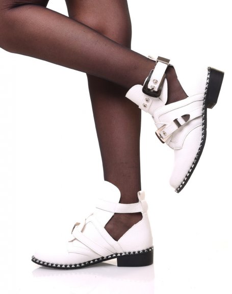 White openwork ankle boots with studded soles