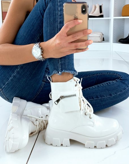 White patent lug soled ankle boots with pocket