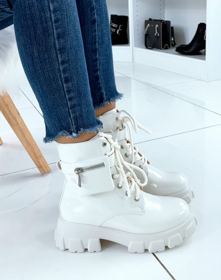 White patent lug soled ankle boots with pocket