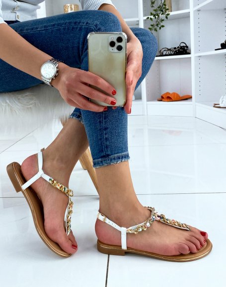 White sandals with colorful fabrics and golden chain