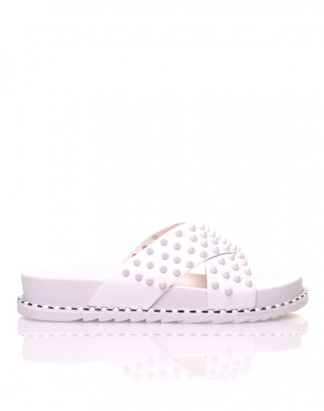 White sandals with crossed studs