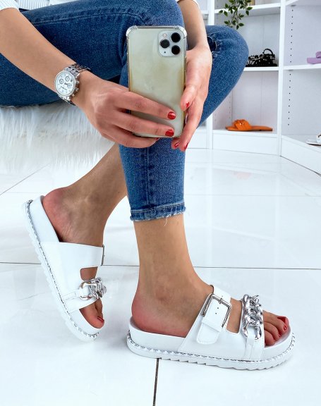 White sandals with double straps and silver chain