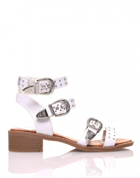 White sandals with embellished buckles