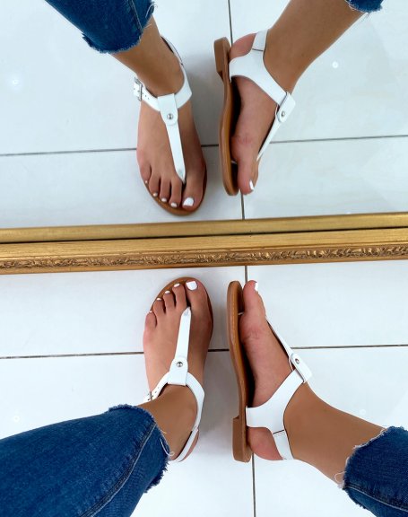 White sandals with gold studs