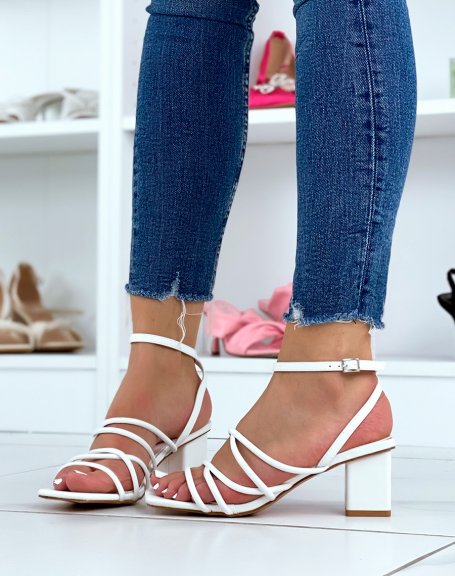 White sandals with heel and multiple straps
