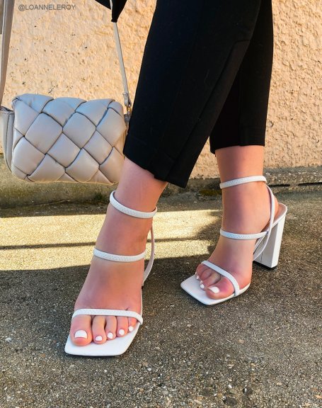 White sandals with high strap and high heel