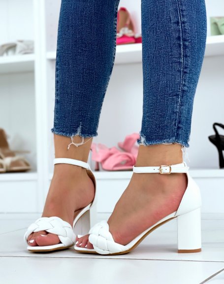 White sandals with medium heel and braided strap