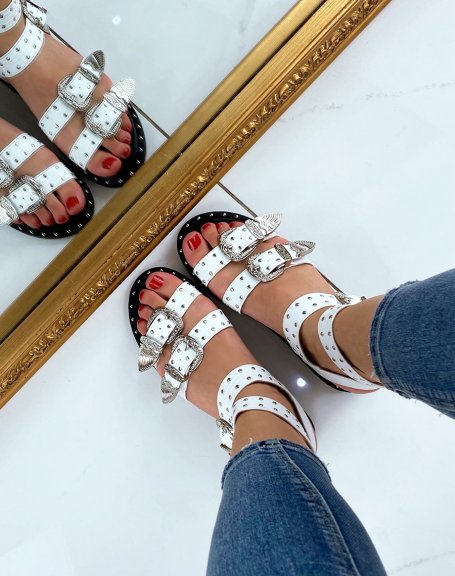 White sandals with multiple adjustable studded straps