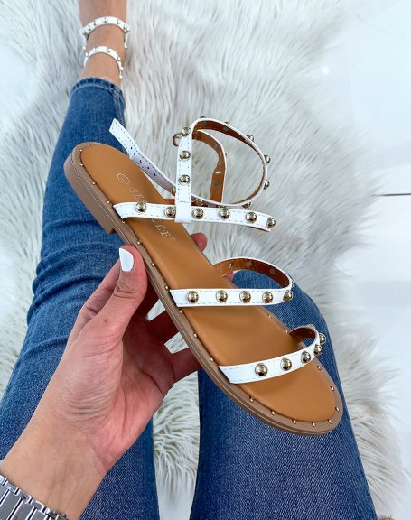 White sandals with multiple studded straps