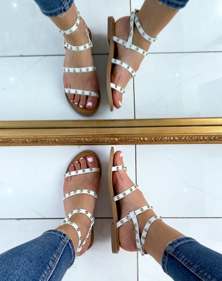 White sandals with multiple studded straps