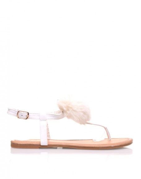 White sandals with pompoms
