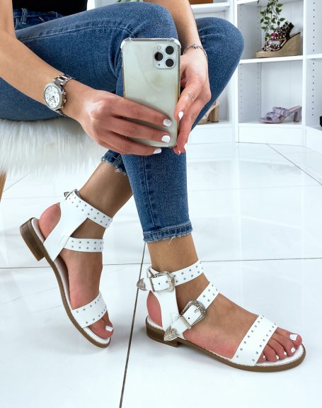 White sandals with studded details