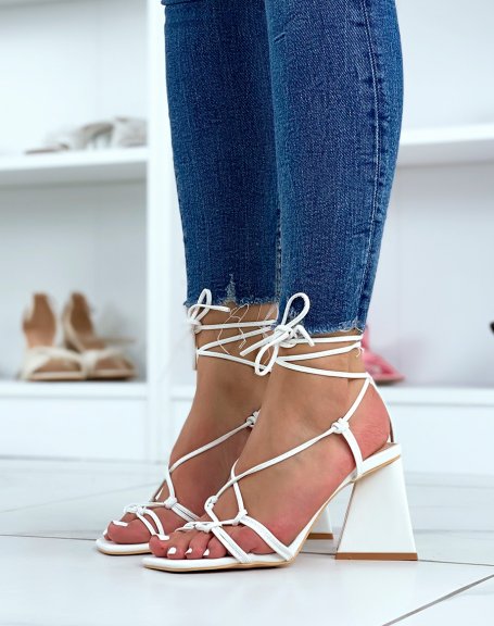 White sandals with thick heel and multiple straps