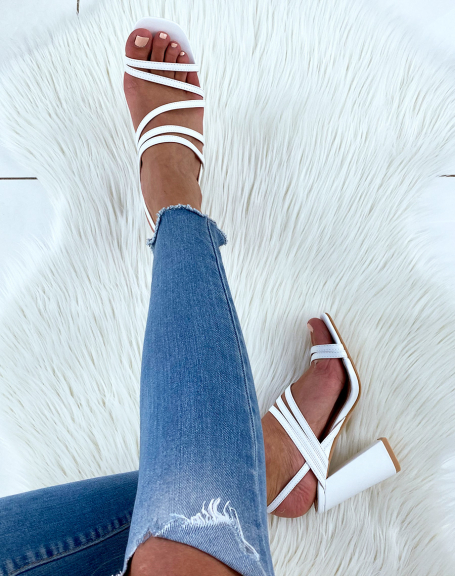 White sandals with thin straps and square heel
