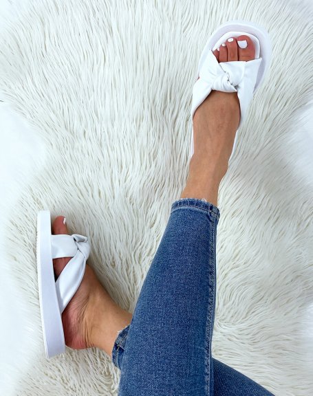 White sandals with wide padded straps