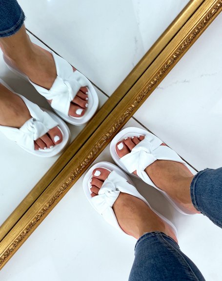 White sandals with wide padded straps