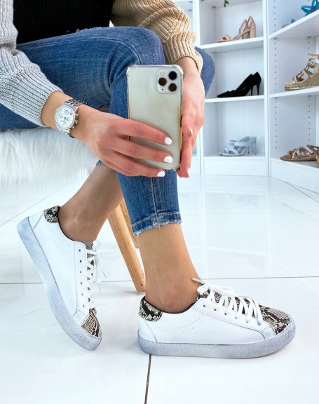 White sneaker with python effect pattern