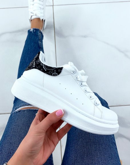 White sneakers with Aztec black back inserts