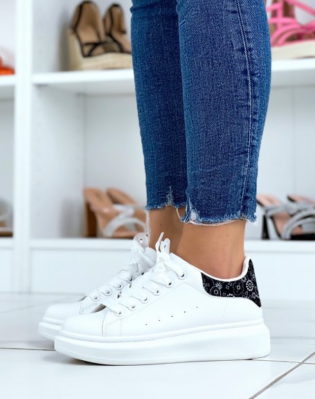White sneakers with Aztec black back inserts