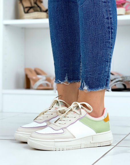 White sneakers with beige, green, pink, purple and mustard inserts