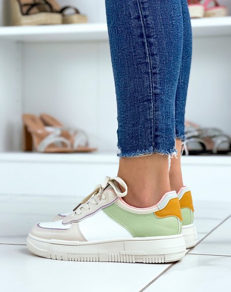 White sneakers with beige, green, pink, purple and mustard inserts