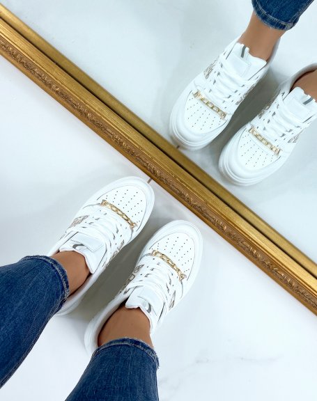 White sneakers with beige printed fabric and golden chain