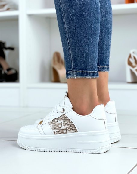 White sneakers with beige printed fabric and golden chain