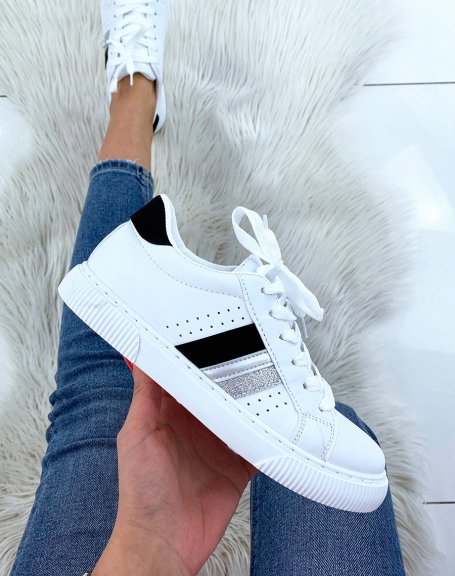 White sneakers with black and silver triple inserts