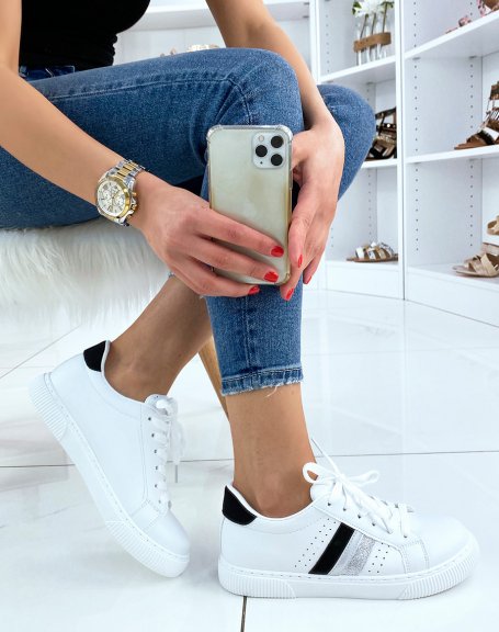 White sneakers with black and silver triple inserts