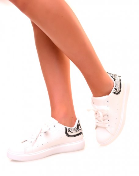 White sneakers with black yoke and python